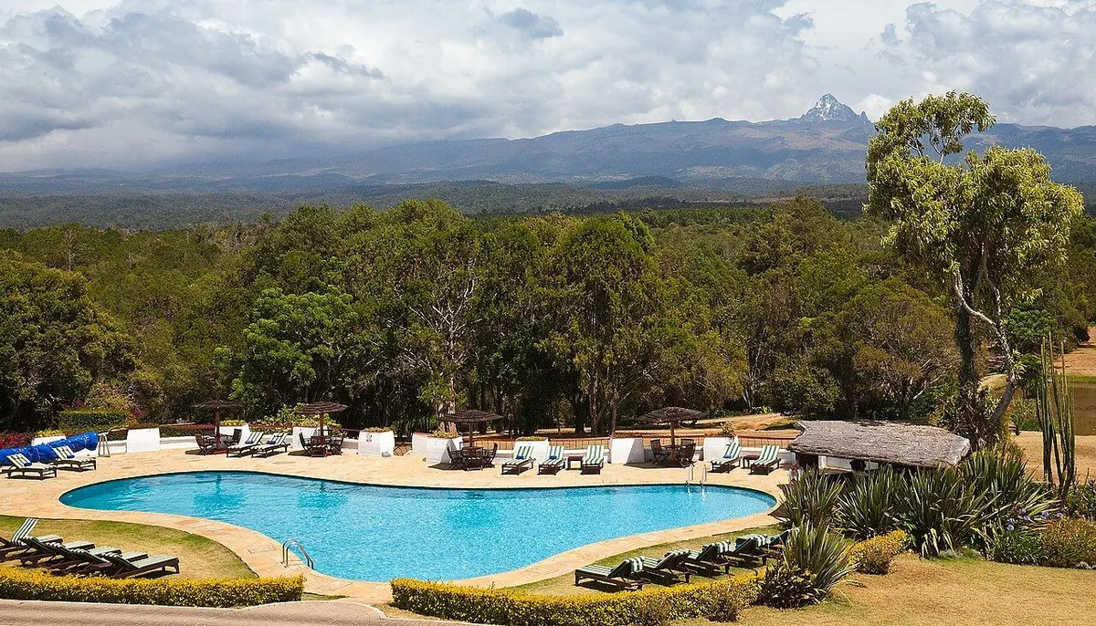 The pool with Mount Kenya in the distance. Photo: John Hickey-Fry, CC BY 2.0, via Wikimedia Commons