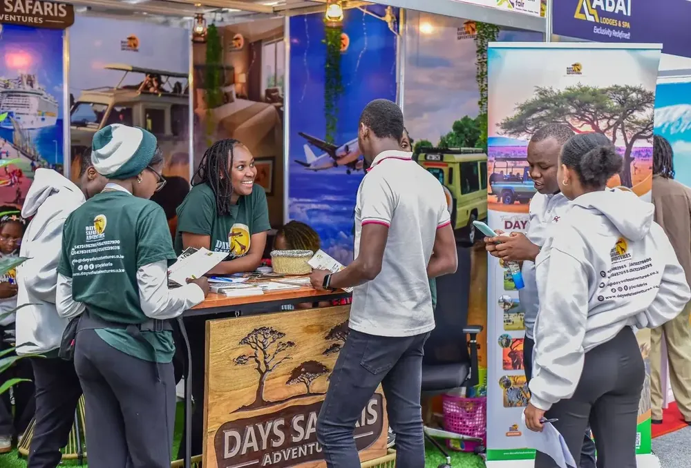 Days Safaris Adventures staff at their trade-show stand